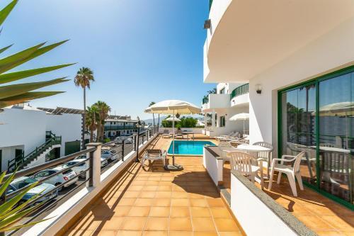 Apartamentos Los Quiqueres Пуэрто дель Кармен Экстерьер фото