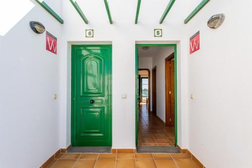 Apartamentos Los Quiqueres Пуэрто дель Кармен Экстерьер фото