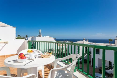 Apartamentos Los Quiqueres Пуэрто дель Кармен Экстерьер фото