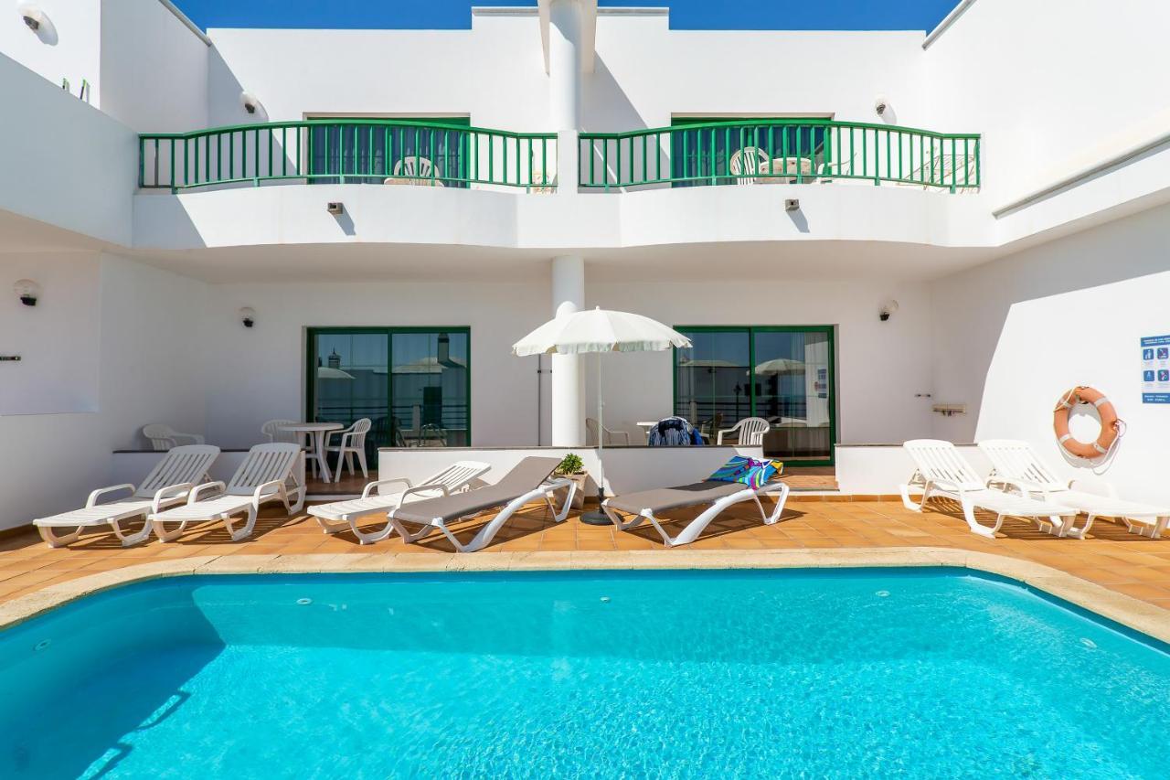 Apartamentos Los Quiqueres Пуэрто дель Кармен Экстерьер фото